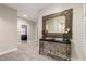 Hallway with decorative console table, decorative mirror, neutral walls and tile floors at 14058 S 24Th Way, Phoenix, AZ 85048
