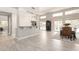 Open-concept living area with bar seating and dining space, perfect for entertaining guests at 14058 S 24Th Way, Phoenix, AZ 85048
