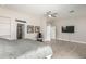 View of the main bedroom showcasing ceiling fan and ensuite bathroom at 14058 S 24Th Way, Phoenix, AZ 85048