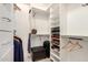 Well-organized walk-in closet with custom shelving and ample storage space at 14058 S 24Th Way, Phoenix, AZ 85048