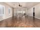 Upstairs loft area with wood flooring, ceiling fan, and natural light at 14494 W Yucatan St, Surprise, AZ 85379