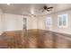 Spacious upstairs loft featuring laminate wood flooring, recessed lighting, and natural light at 14494 W Yucatan St, Surprise, AZ 85379
