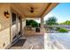 Inviting outdoor kitchen with built-in grill and serene backyard views, perfect for al fresco dining at 14494 W Yucatan St, Surprise, AZ 85379