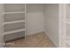 Spacious walk-in closet with built-in shelving offers ample storage space at 14494 W Yucatan St, Surprise, AZ 85379