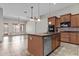 Spacious kitchen with a functional island and ample storage for cooking and entertaining at 14676 W Banff Ln, Surprise, AZ 85379