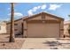 Welcoming home featuring a neutral exterior, easy-care landscaping, and an attached two-car garage at 1507 W Mesquite Ave, Apache Junction, AZ 85120