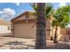 Attractive single-story home boasting easy-care landscaping and an attached two-car garage at 1507 W Mesquite Ave, Apache Junction, AZ 85120