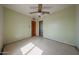 Bedroom with tile floors, closet and door at 1614 S 6Th Ave, Phoenix, AZ 85003