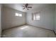 Bedroom with tile floors and a view from its two windows at 1614 S 6Th Ave, Phoenix, AZ 85003