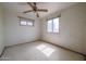 Bedroom featuring tile floors, a ceiling fan, and natural light from its windows at 1614 S 6Th Ave, Phoenix, AZ 85003