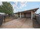 Charming single-story home featuring a covered parking area and well-maintained front yard at 1614 S 6Th Ave, Phoenix, AZ 85003
