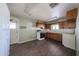 A well lit kitchen features ample cabinet space, a gas range, and an exterior access door at 1614 S 6Th Ave, Phoenix, AZ 85003