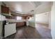 An open kitchen featuring a gas range and a connection to the dining room or living space at 1614 S 6Th Ave, Phoenix, AZ 85003