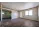 Bright living room with laminate floors, perfect for relaxing or entertaining guests at 1614 S 6Th Ave, Phoenix, AZ 85003
