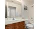 Bathroom features a vanity with a white countertop and oak cabinetry at 1632 E Leslie Ave, San Tan Valley, AZ 85140