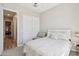 Comfortable bedroom featuring a closet, neutral tones, and a ceiling fan at 1865 N 141St Ave, Goodyear, AZ 85395