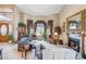 Comfortable living room with fireplace, lots of light and traditional furnishings at 18851 N 69Th Ave, Glendale, AZ 85308