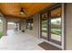 Covered back patio with ceiling fan and view of the pool at 2111 E Yellowstone Pl, Chandler, AZ 85249