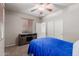 Bedroom featuring neutral walls, a ceiling fan, carpet, and a light-blocking shade at 2111 E Yellowstone Pl, Chandler, AZ 85249