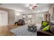 Open-concept living room and kitchen area, with stylish furnishings and plenty of natural light at 2111 E Yellowstone Pl, Chandler, AZ 85249