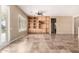 Open living room boasts built-in cabinetry and lots of natural light at 22222 N Pedregosa Dr, Sun City West, AZ 85375
