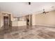 Open concept living space featuring beautiful flooring, modern lighting, and seamless flow at 22222 N Pedregosa Dr, Sun City West, AZ 85375