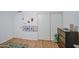 Neutral bedroom features laminate floors, superhero décor, and closet storage at 2505 E Desert Cactus St, Phoenix, AZ 85032