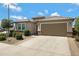 Beautiful single-story home featuring a two-car garage and well-maintained landscaping at 25974 W Horsham Dr, Buckeye, AZ 85396