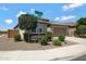 Corner lot with well-maintained landscaping, a two-car garage, and charming desert curb appeal at 25974 W Horsham Dr, Buckeye, AZ 85396