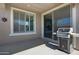 Covered patio with a gas grill, perfect for outdoor cooking and entertaining at 25974 W Horsham Dr, Buckeye, AZ 85396