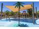 Community splash pad with various water features, offering a fun and refreshing recreational area for families at 25974 W Horsham Dr, Buckeye, AZ 85396