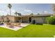 Backyard area with patio and seating, perfect for outdoor relaxation and entertaining at 2611 E Cheryl Dr, Phoenix, AZ 85028