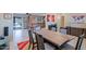 Inviting dining room with seating for six with backyard patio access and views from the kitchen at 2611 E Cheryl Dr, Phoenix, AZ 85028