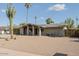 Well-kept single story residence showcasing desert landscaping at 2611 E Cheryl Dr, Phoenix, AZ 85028