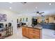 Spacious kitchen with island and view to living room at 2611 E Cheryl Dr, Phoenix, AZ 85028