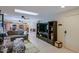 Relaxing living room showcasing a skylight and an open layout with the kitchen in view at 2611 E Cheryl Dr, Phoenix, AZ 85028
