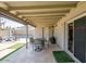 Covered patio with an outdoor dining area, a grill, and views of the pool at 2611 E Cheryl Dr, Phoenix, AZ 85028