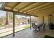 Covered patio with an outdoor dining area, seating, and a view of the pool at 2611 E Cheryl Dr, Phoenix, AZ 85028