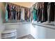 Walk-in closet features custom shelving and organization systems for optimal storage at 2731 E Windsor Ave, Phoenix, AZ 85008