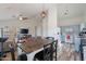 Open living room features modern decor, wood-look floors, vaulted ceilings, and modern lighting at 2731 E Windsor Ave, Phoenix, AZ 85008