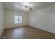 Spacious bedroom with ceiling fan and natural light at 29058 N Cactus Cir, San Tan Valley, AZ 85143