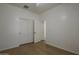 This bedroom showcases hardwood floors and a closet with sliding doors, ensuring ample space for storing personal items at 29058 N Cactus Cir, San Tan Valley, AZ 85143