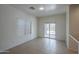 Bright dining area with sliding glass door to backyard at 29058 N Cactus Cir, San Tan Valley, AZ 85143