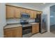 Kitchen features stainless steel appliances and ample cabinet space at 29058 N Cactus Cir, San Tan Valley, AZ 85143