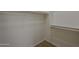 Walk-in closet with shelving and hanging racks for organization and storage at 29058 N Cactus Cir, San Tan Valley, AZ 85143