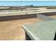 View of the backyard and surrounding neighborhood including sidewalks and desert landscaping at 31866 N Bandit Rd, San Tan Valley, AZ 85143
