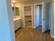 Bright bathroom with double sinks, modern vanity, and a walk in closet at 31866 N Bandit Rd, San Tan Valley, AZ 85143