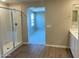 Elegant bathroom with a glass-enclosed shower and a vanity with modern fixtures at 31866 N Bandit Rd, San Tan Valley, AZ 85143