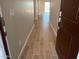 Inviting entryway showcasing stylish wood-look tile floors and neutral wall colors at 31866 N Bandit Rd, San Tan Valley, AZ 85143