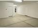 Spacious two car garage with multiple doors including access to the home's interior at 31866 N Bandit Rd, San Tan Valley, AZ 85143